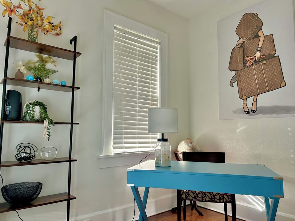 Dedicated office space with double french doors that opens onto the back deck.