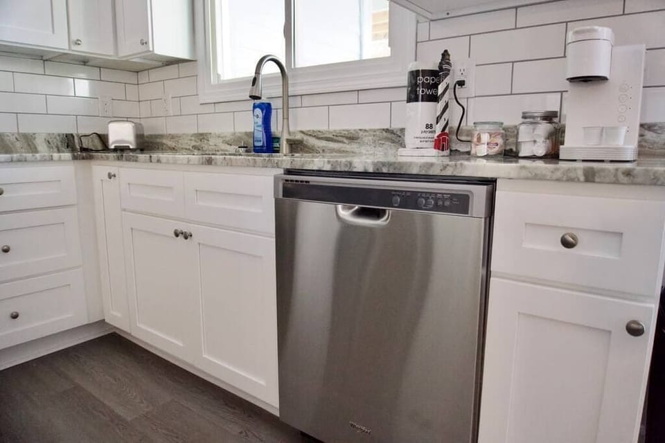 Beautiful open kitchen with new stainless-steel appliances