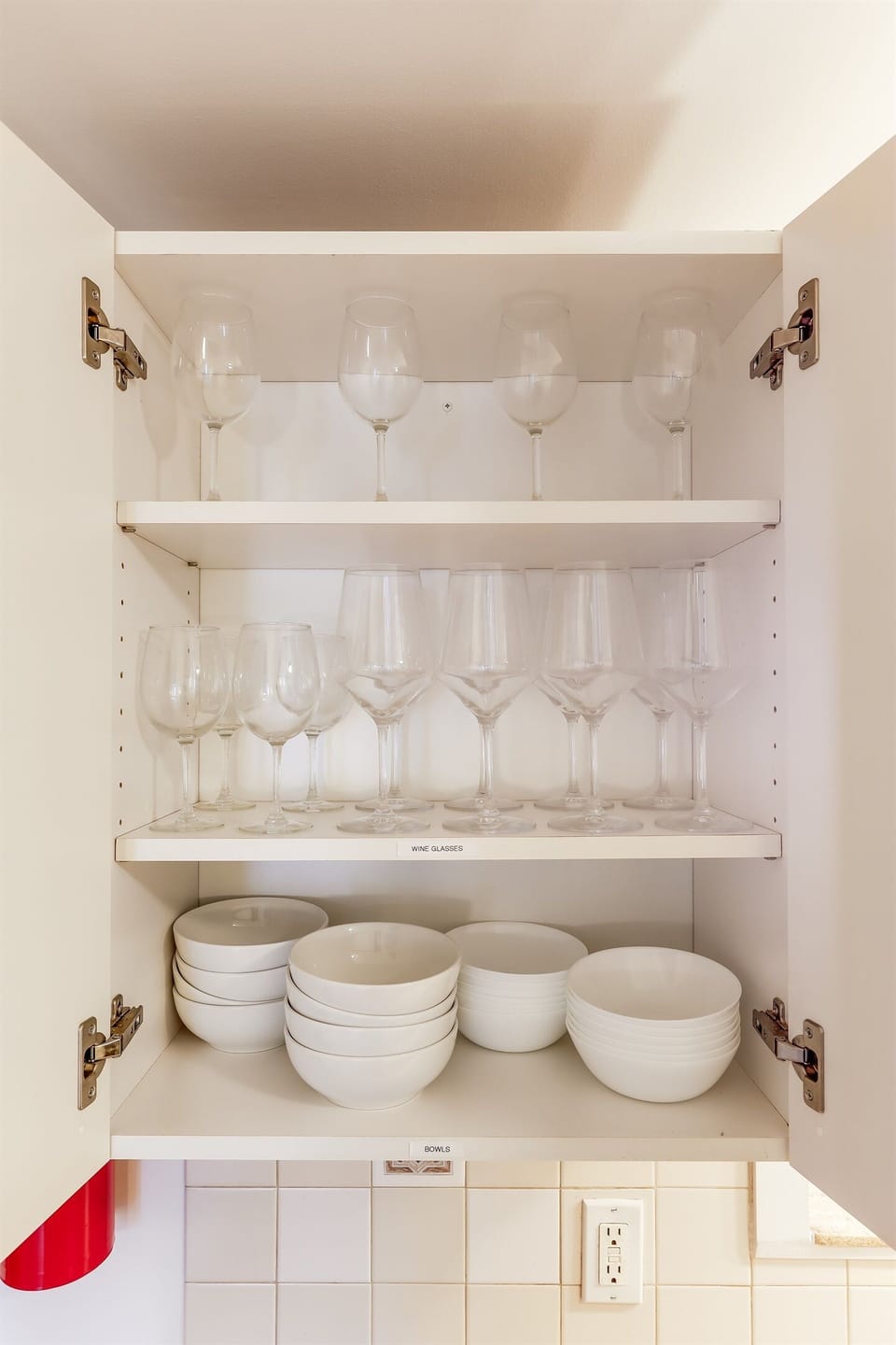 Plenty of wine glasses and soup bowls