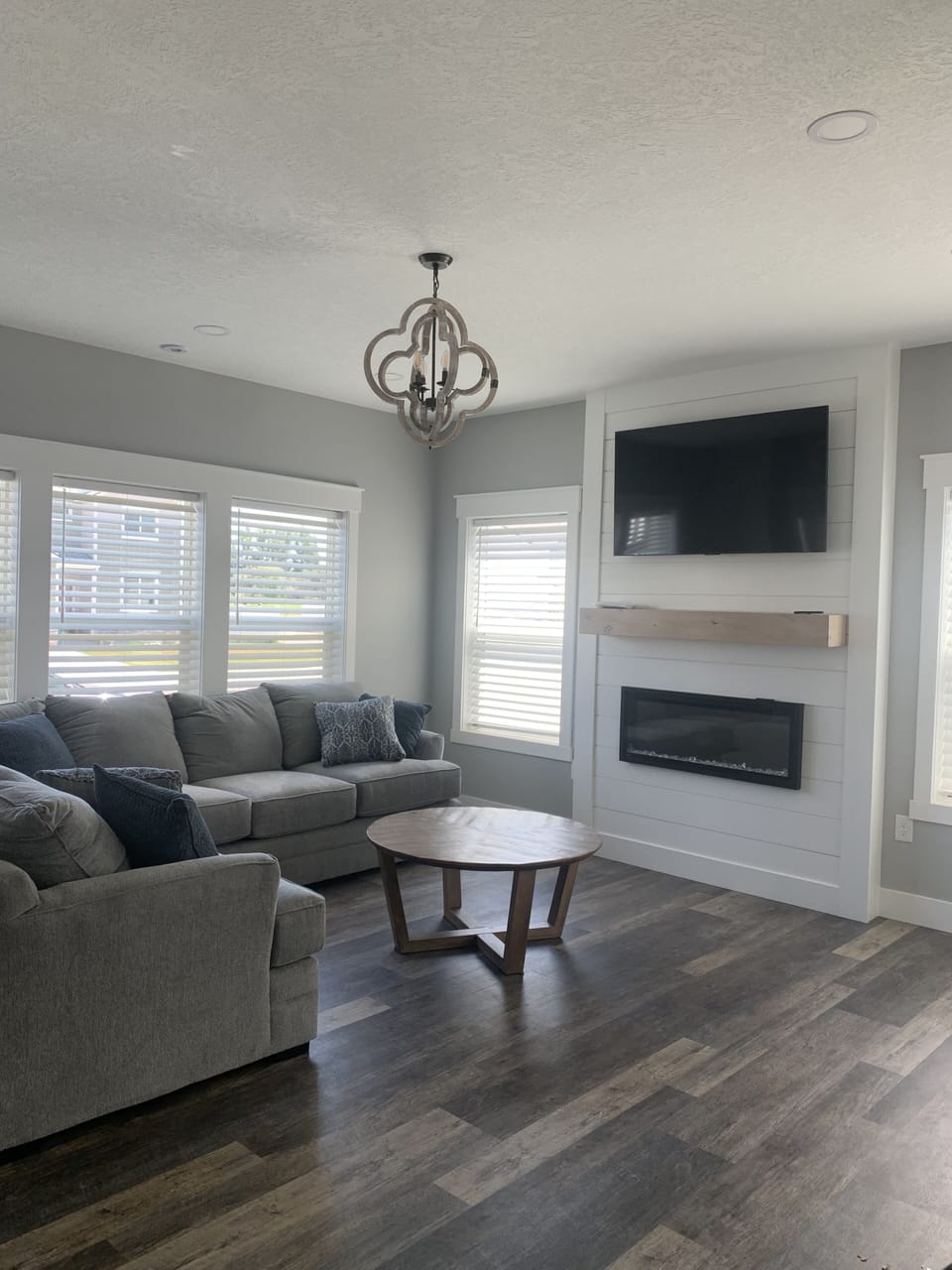 Comfortable Living Room with Smart t.v., fireplace, and pull out couch