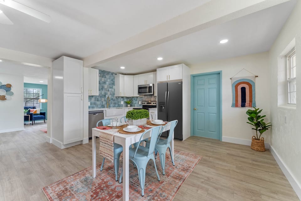 Kitchen & Dining room: The open kitchen design has plenty of room to prepare meals. The perfect place to entertain family and friends. REFRIGERATOR INCLUDED but was not delivered prior to picture day.