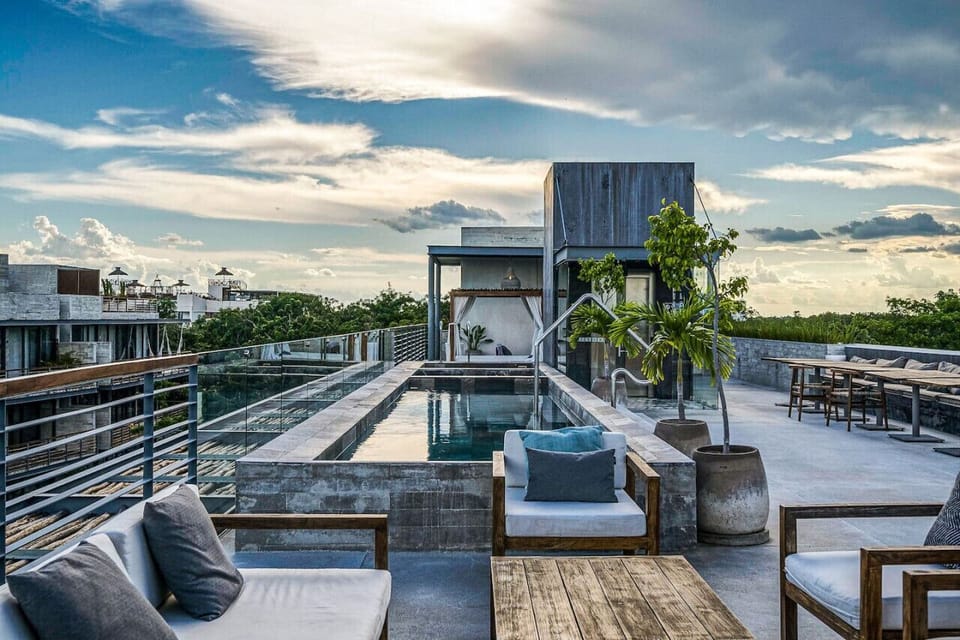 Rooftop Pool with Lounge Seats, Sun Beds at the back