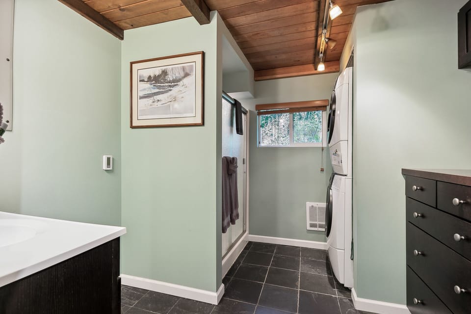 Bathroom has heated floors and a standing shower