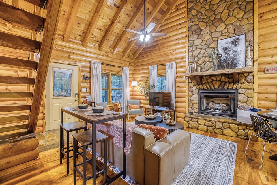 Pick a movie, settle into the leather couch, and let the gas fireplace run — the 50-inch TV is right there and the evening is all yours.