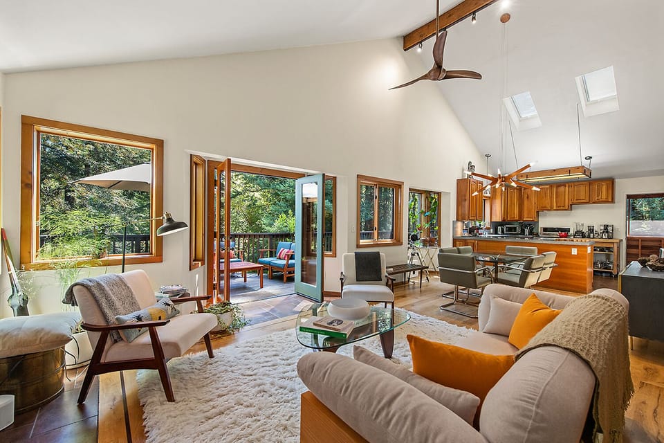 Open concept living room, dining area, and kitchen.