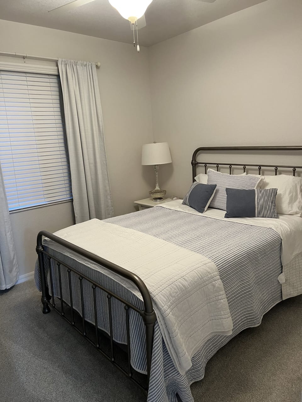 Second bedroom with queen bed and TV
