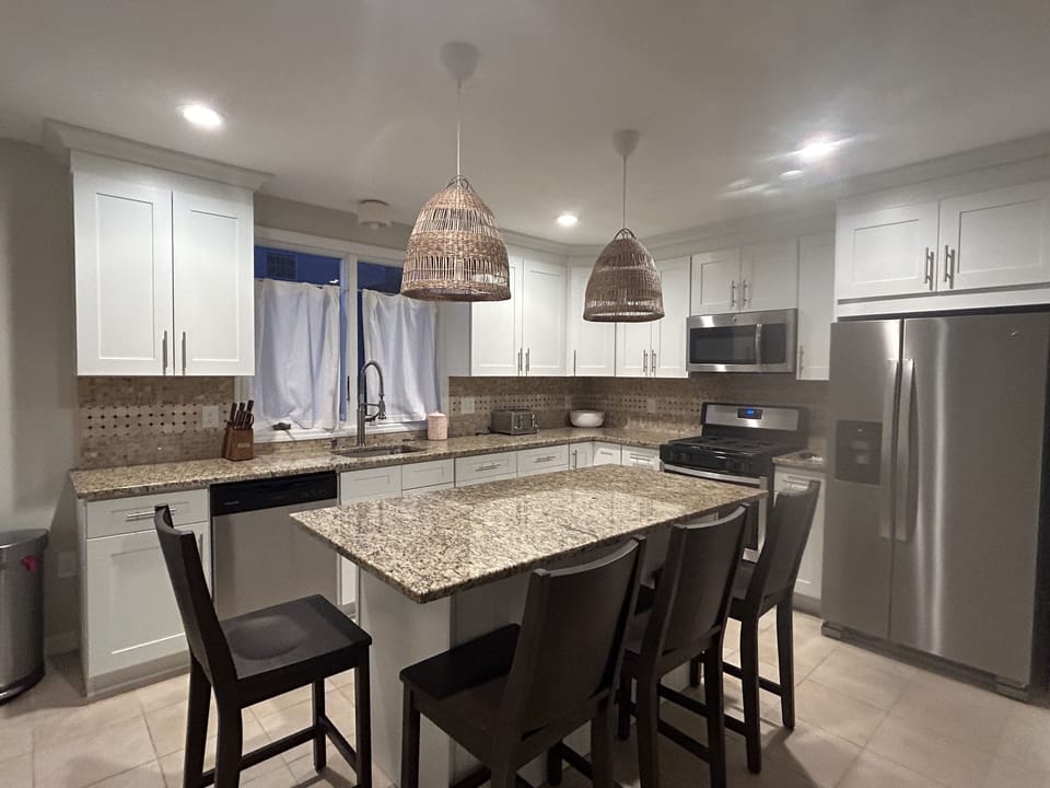 Kitchen Island with four stools.