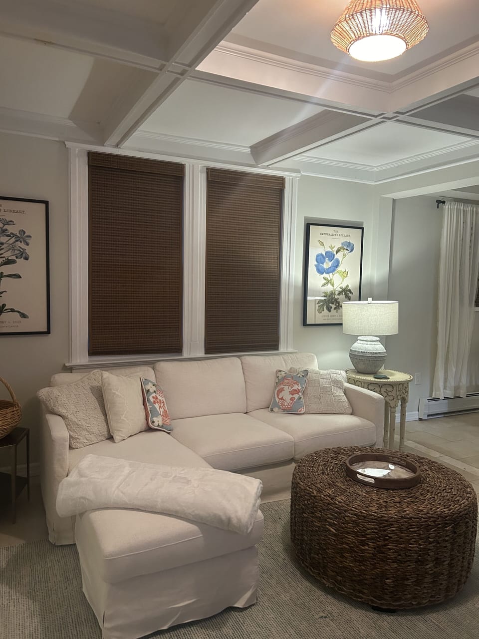TV viewing area with sectional & swivel chair.