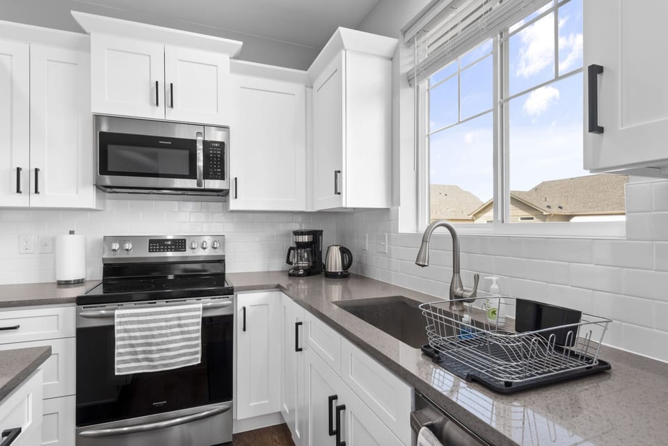 Fully renovated kitchen with quartz countertops