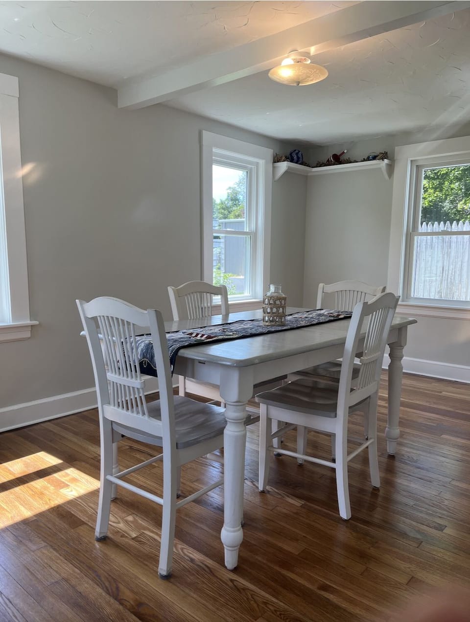 The 6-person dining table extends to host additional guests