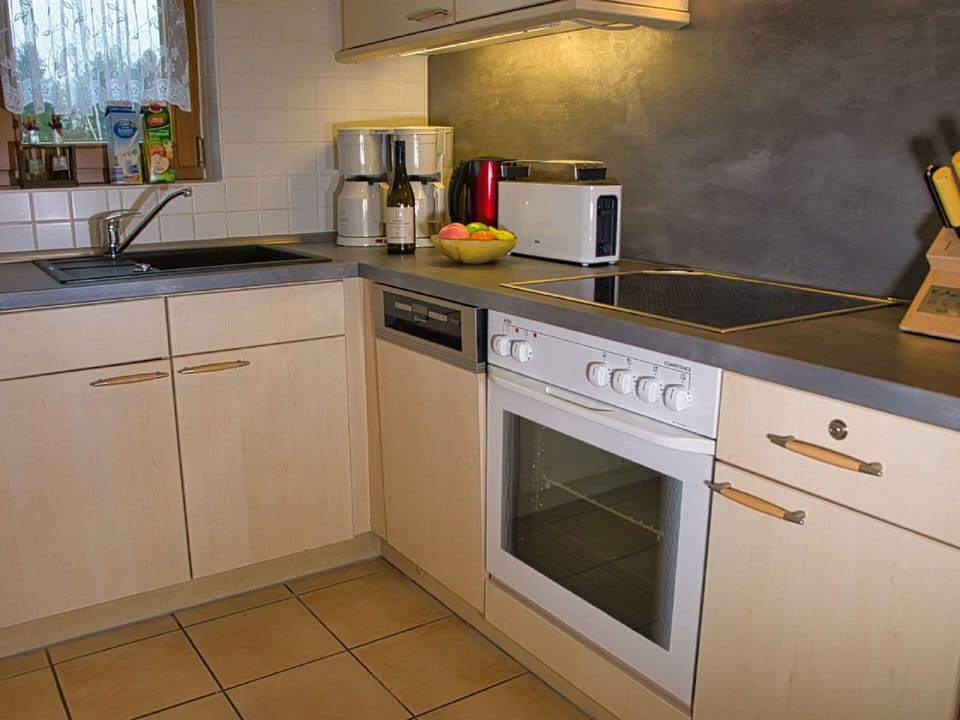 Countertop, Cabinetry, Kitchen Sink, Property, Tap, Sink, Kitchen, Kitchen Appliance, Kitchen Stove, Window