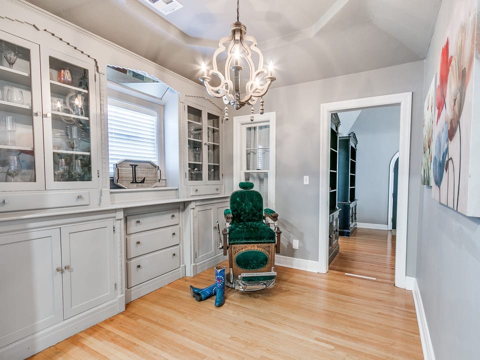 Kick up your feet in this vintage barber's chair. 