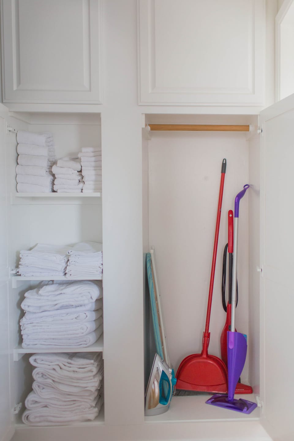 Extra linens/towels + cleaning supplies located in the hallway cabinets.