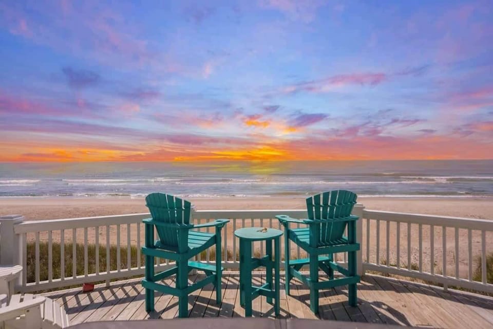 Find your escape at Topsail's Treasure, a beachfront home only 10 steps away from North Topsail Beach.