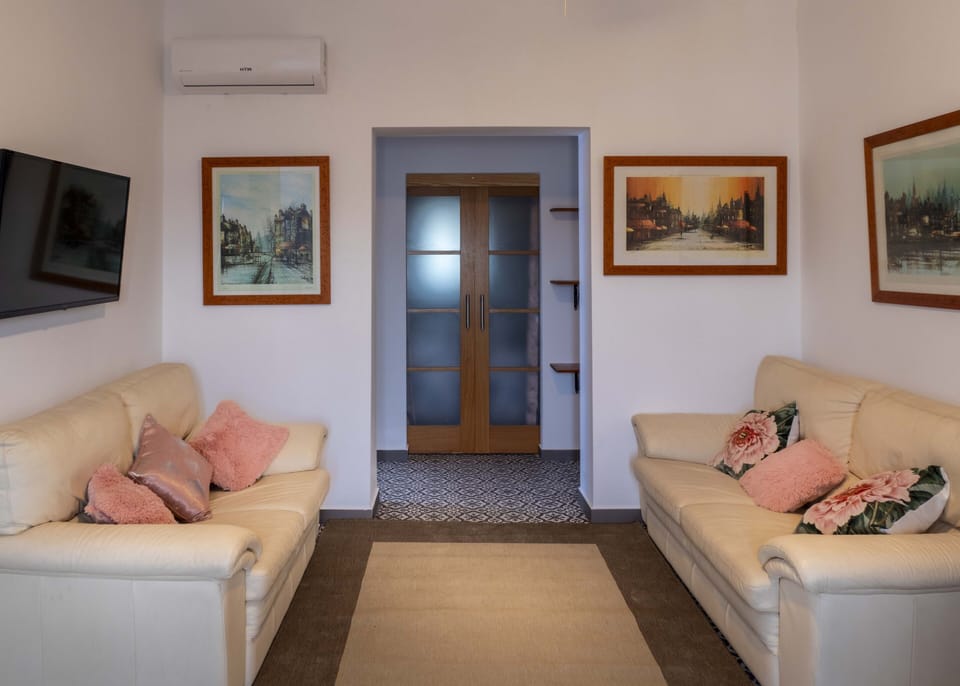 Villa living area showing passageway to bedrooms 1 and 2