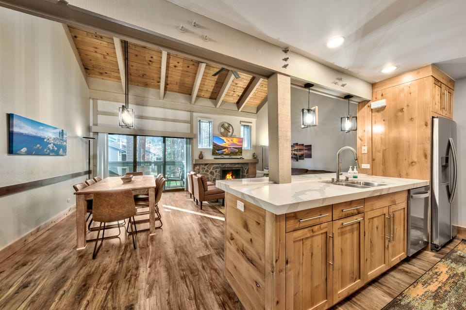 Gather around your spacious kitchen island while dinner simmers, then cozy up by the fireplace for memorable evenings together.