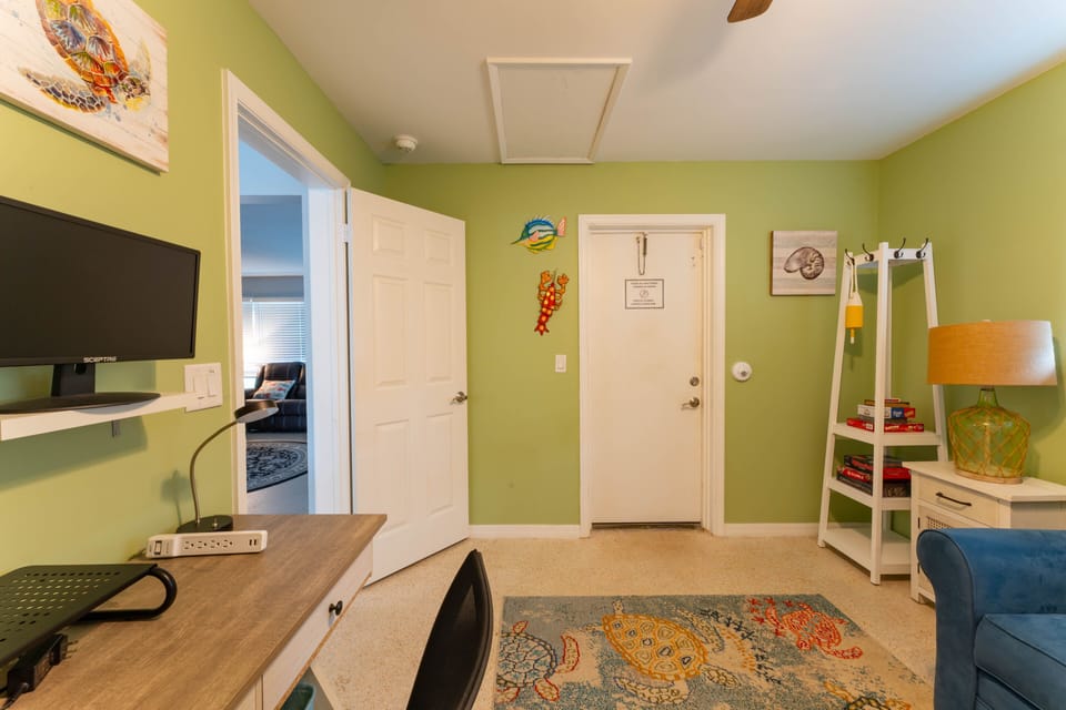 Productivity meets comfort in our bright home office.