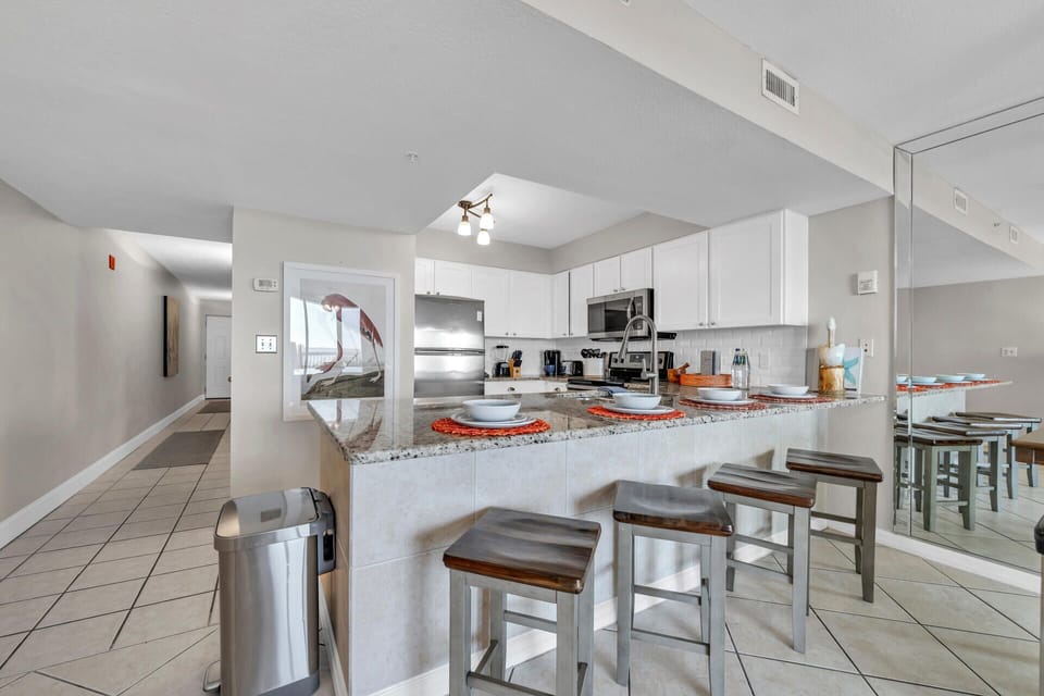 Gather around your stylish granite island where every meal becomes a moment to share with loved ones.