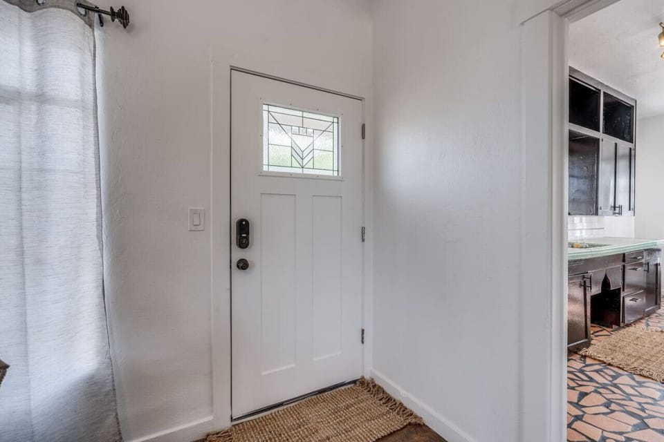 Front entrance and kitchen to the right