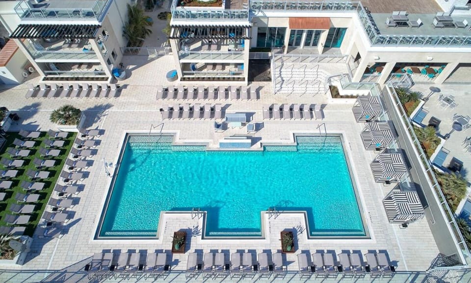 Soak up sunshine around a spacious resort-style pool deck.