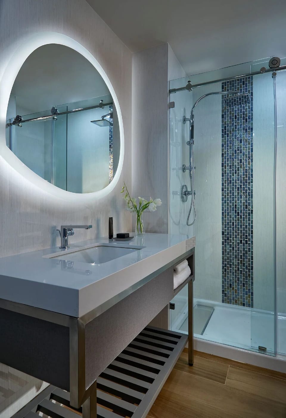 Rejuvenate with spa-like finishes and a bright, modern sink.