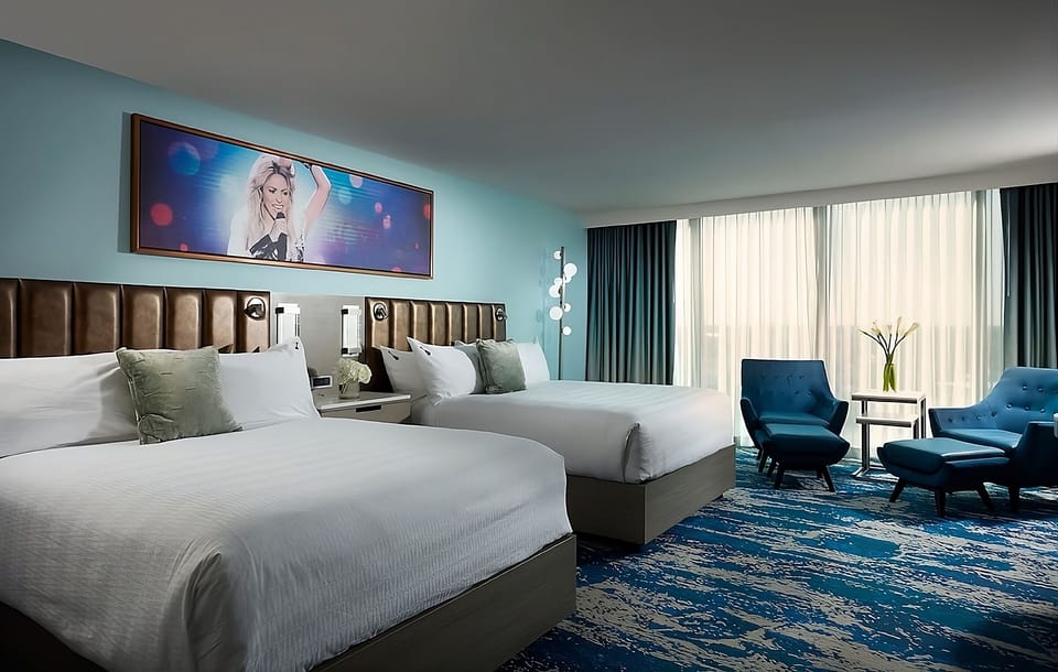 Settle into two queen beds with cozy, boutique style.