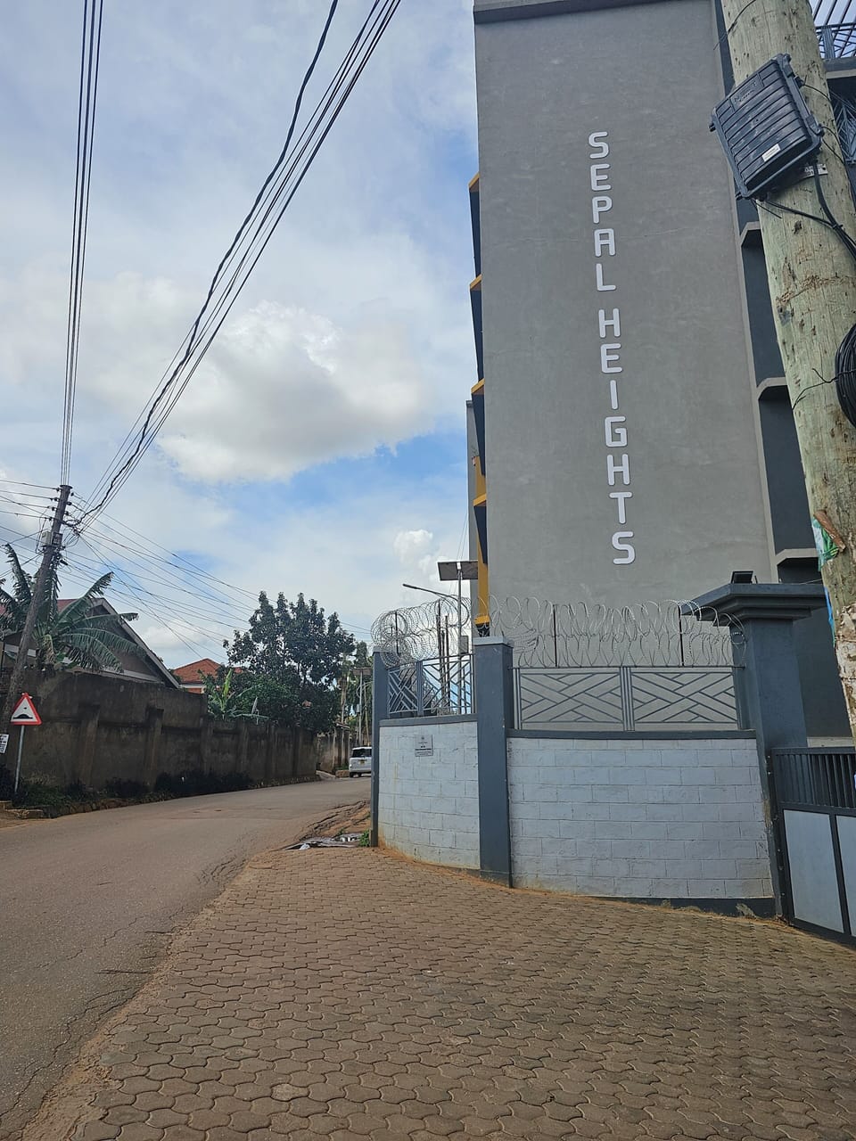 View of Canon road from apartment entry gate