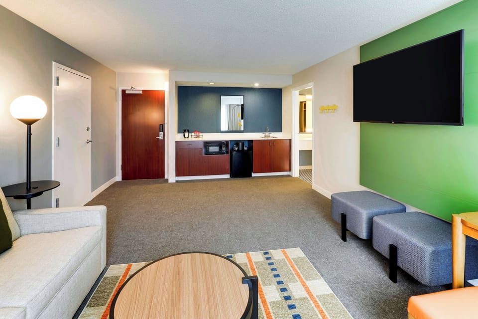 Gather comfortably with a spacious lounge and snack-ready kitchenette.