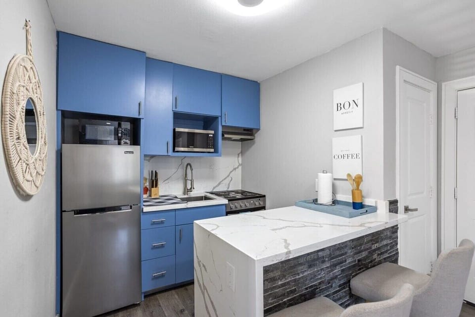 Kitchen with basic amenities and counter top appliances