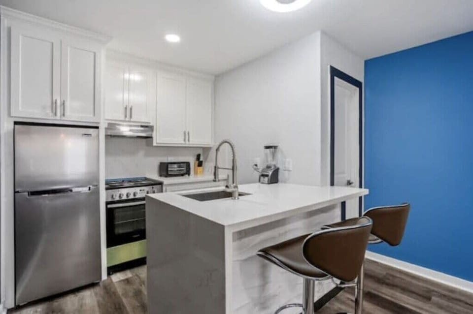 Kitchen with basic amenities and counter top appliances