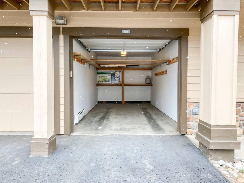 1 Car Heated Garage, 1 Parking Space is also included just outside of the garage (can accommodate 2 regular-sized vehicles total)