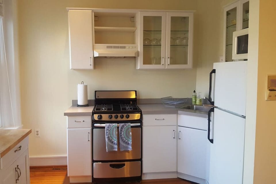Comfortable kitchen with basic cooking necessities.