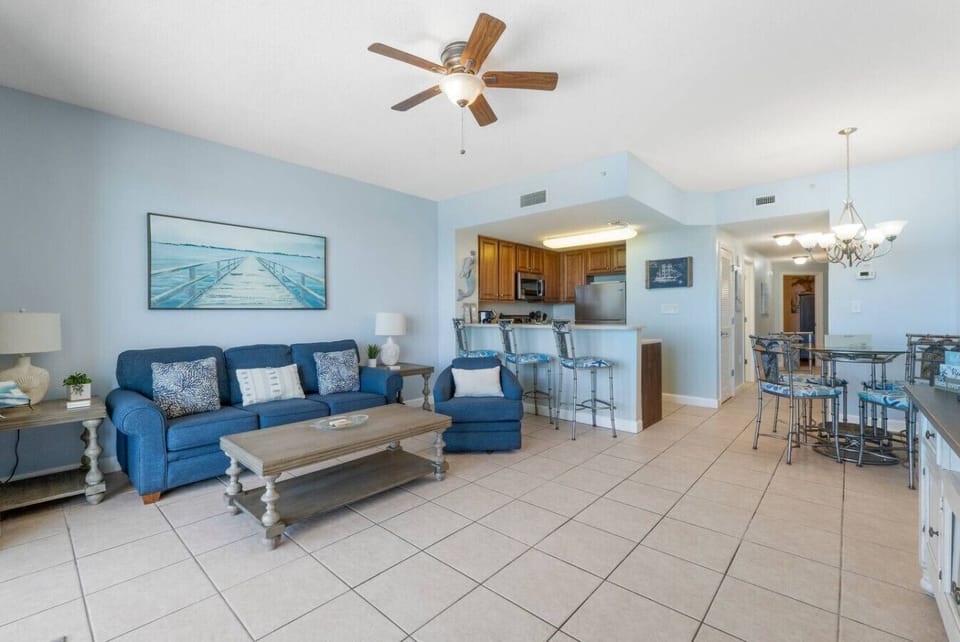 Oceanfront Living Area with Flat Screen TV, Sleeper Sofa and Private Balcony Access