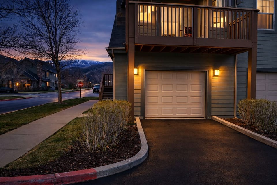Attached private garage and dedicated entry provide added convenience and easy year-round access.