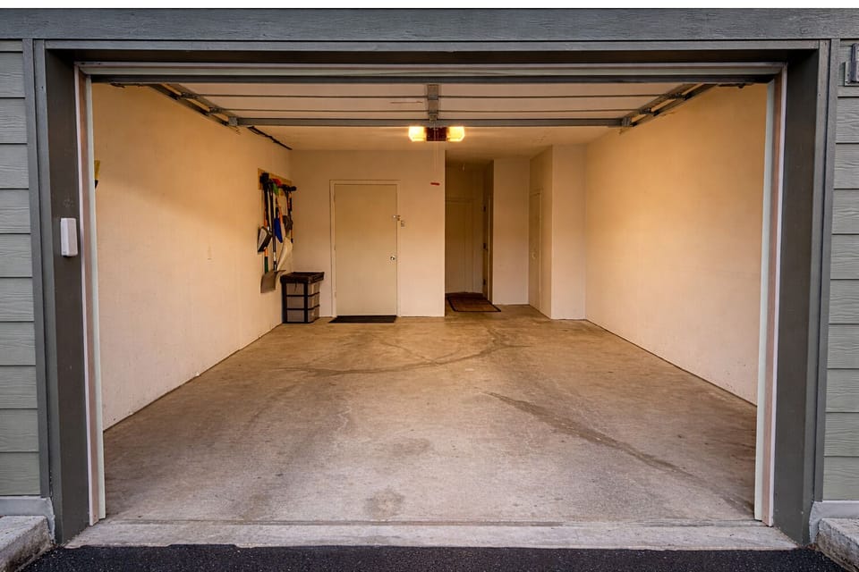 Oversized garage offering secure parking and additional storage for outdoor gear and equipment.