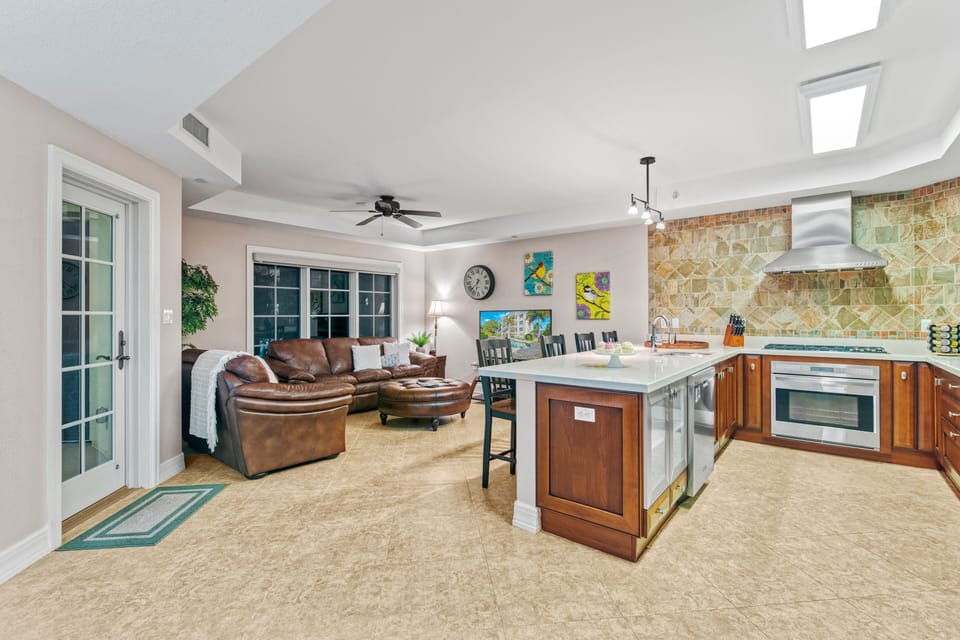 Light, airy, and effortlessly connected—this open-concept space invites you to cook, unwind, and stay close to the ones who matter most.