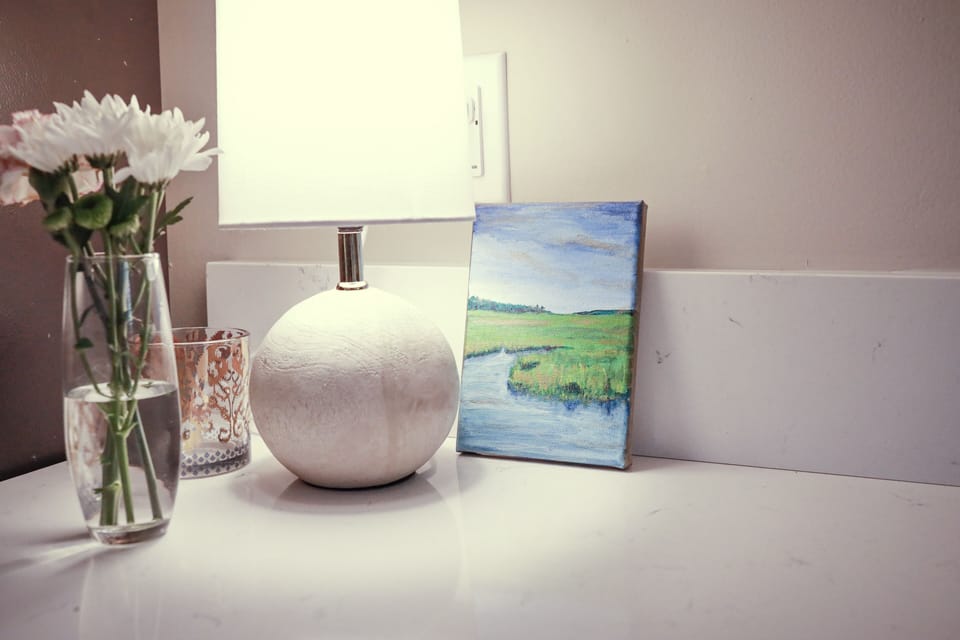 You'll find pieces of art like this throughout the home painted by the owner