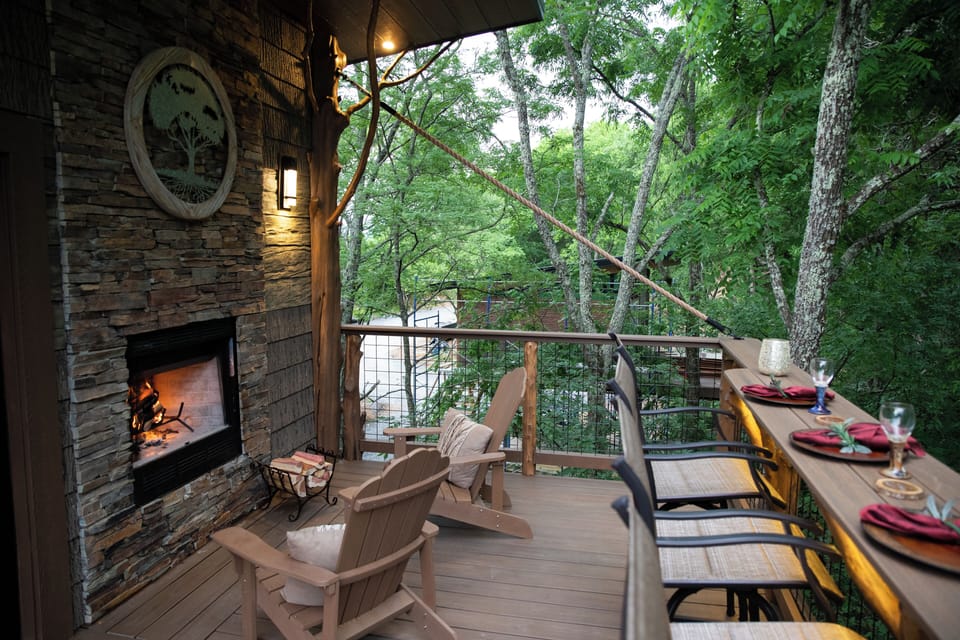 UPPER DECK - WOOD BURNING FIREPLACE - UNLIMITED FIREWOOD & FIRE STARTER KIT - BAR TOP SEATING FOR 4 - 2 ADIRONDACK CHAIRS - SLIDE ACCESS - OUTDOOR BLANKETS PROVIDED
