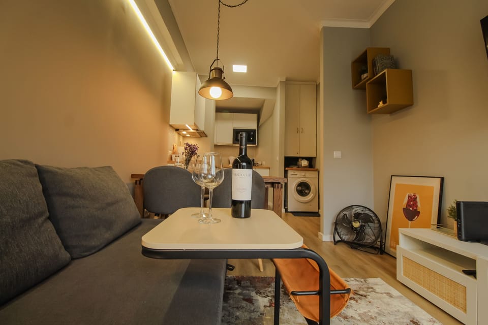 Side table to enjoy your drink while resting on the sofa and watching cable tv.