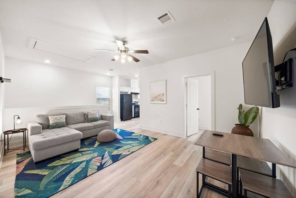 Curl up with a good book in the inviting living room