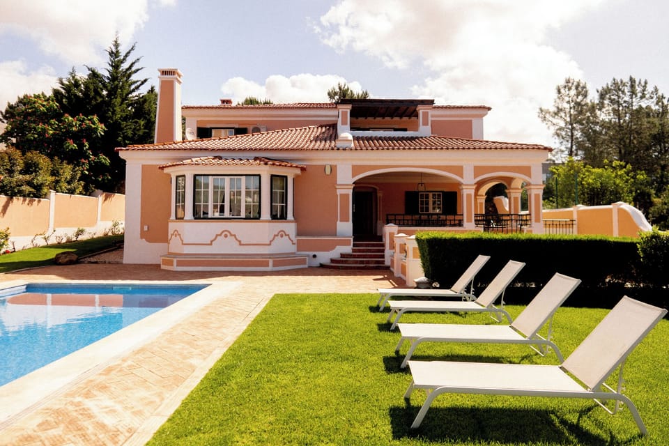 The Swimming Pool - Long chairs, hammocks, green grass and plenty of space.