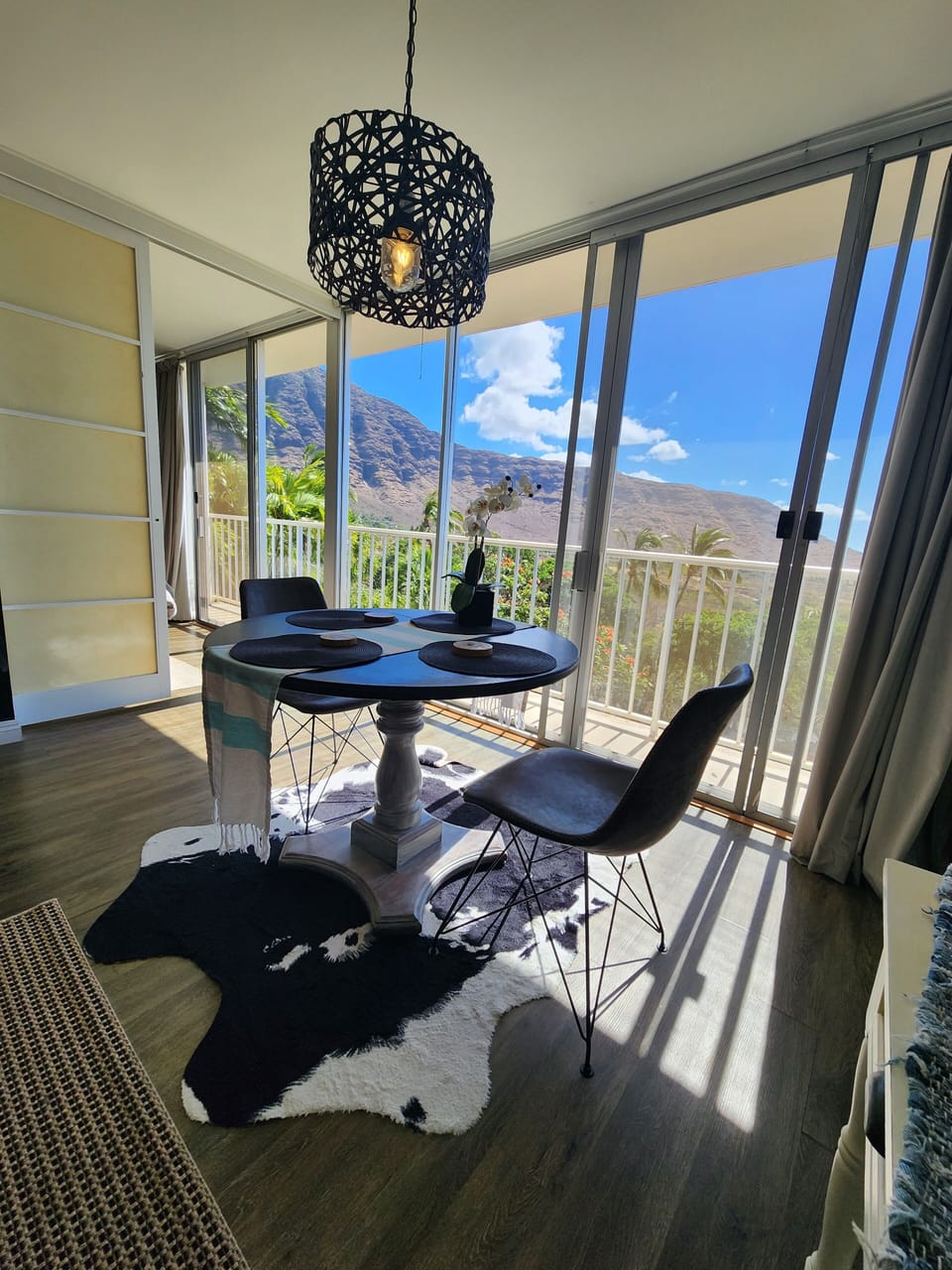Nice little dining table in living room overlooks Makaha Valley and  the ocean