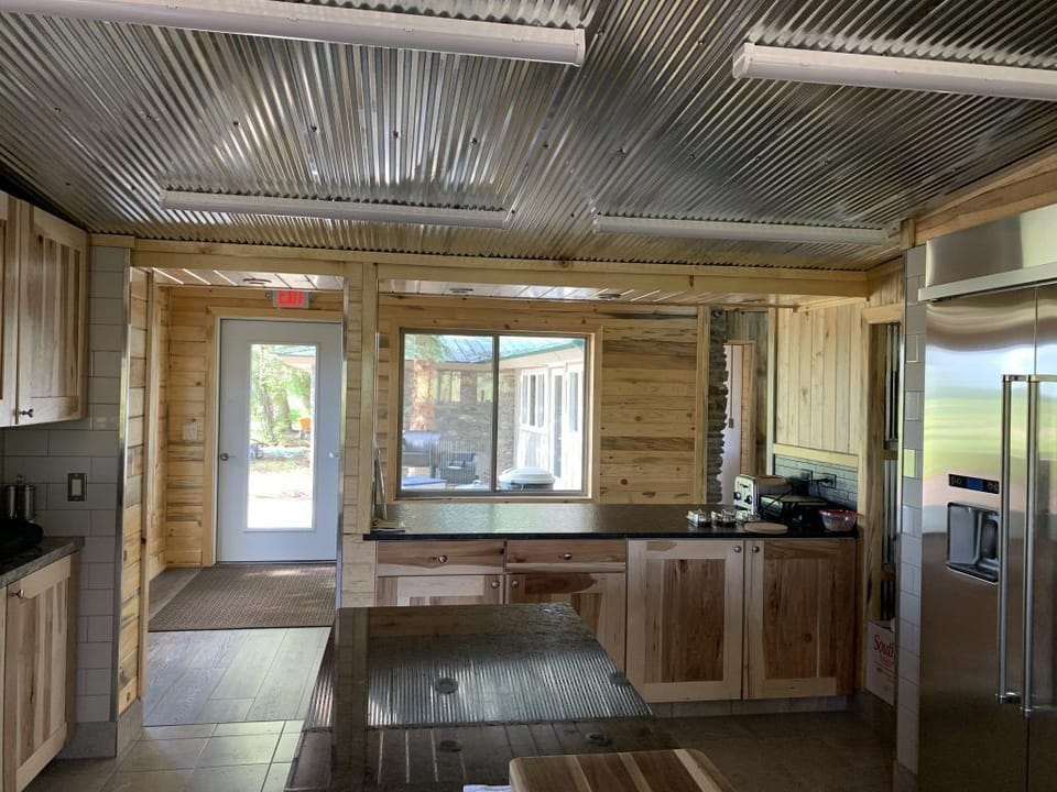 Door to south with smaller outdoor patio space.