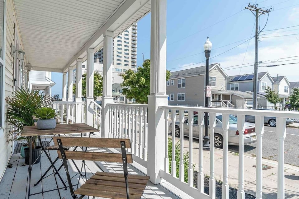 Inviting front porch where you can sit and enjoy the hustle and bustle, enjoy that morning cup of coffee, and soak in the fresh ocean breeze!