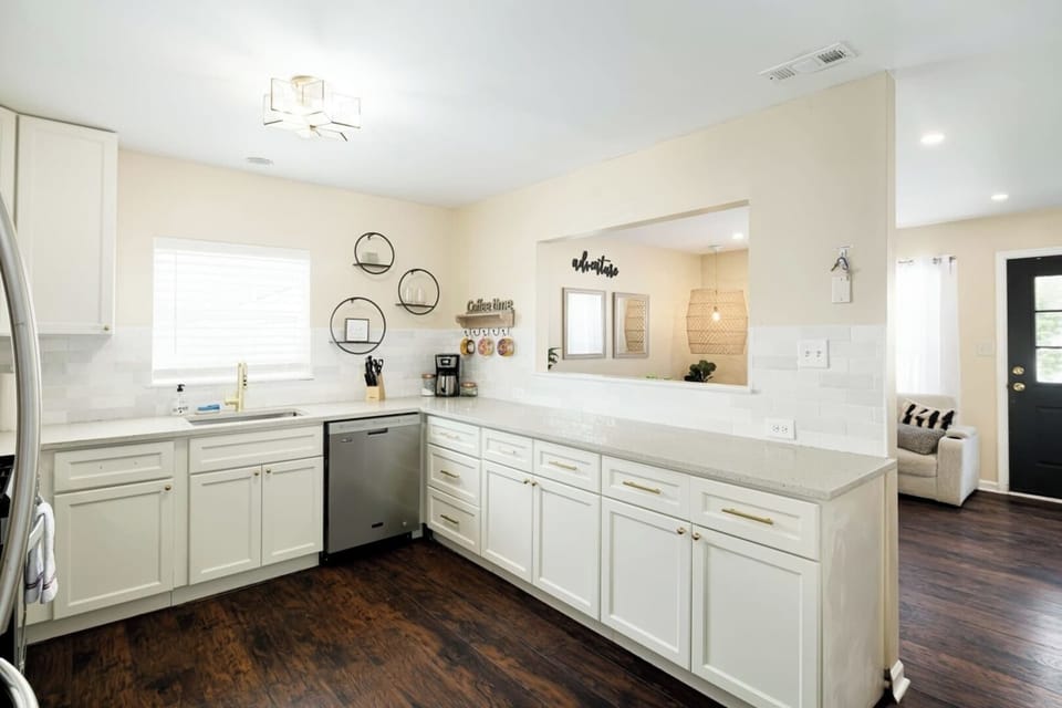 The kitchen opens to the den, great for entertaining but also private for sleeping