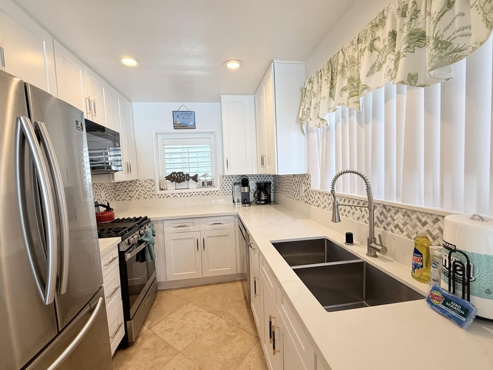 Bright, modern kitchen with stainless steel appliances