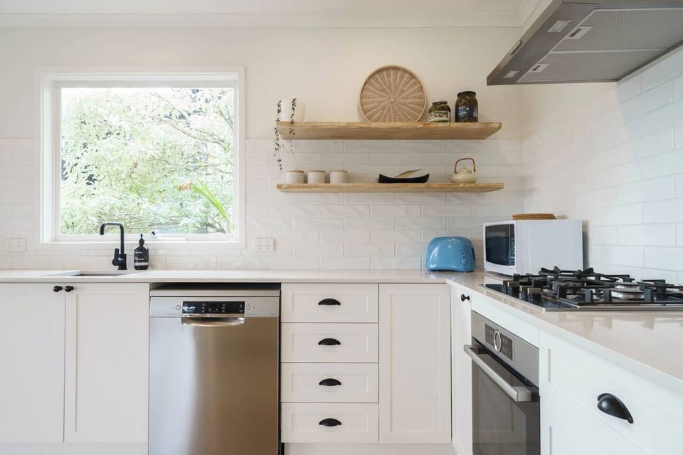  The beautifully appointed kitchen has all the essentials needed to cook up a feast at home. 