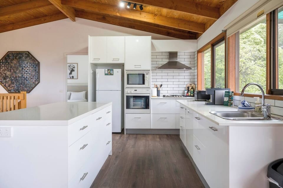 The modern, fully equipped kitchen offers all you need to cook up a feast for the family at home.