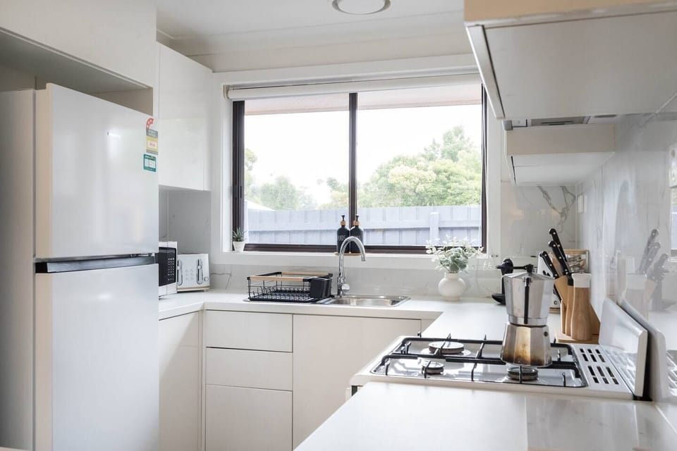  The compact kitchen has everything that’s needed to cook up a feast for the family. 
