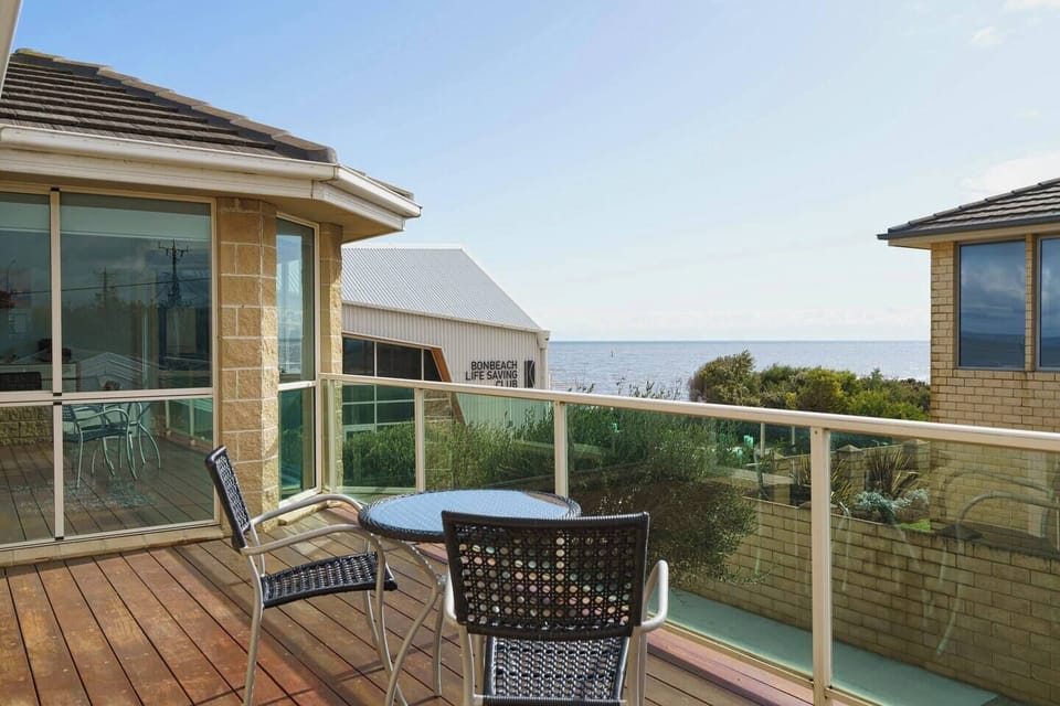  The private balcony offers sweeping oceans, providing the perfect spot to enjoy a morning cuppa or a glass of wine at sunset. 
